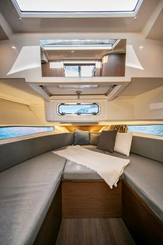 Slide: The Image of 2024 Jeanneau NC Sport 895 cabin interior with modern design and comfortable seating. - 26