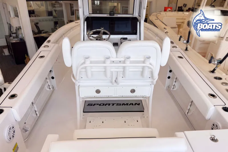 Slide: The Image of 2027 Sportsman Open 212 Center Console boat interior with steering wheel and seating. - 6