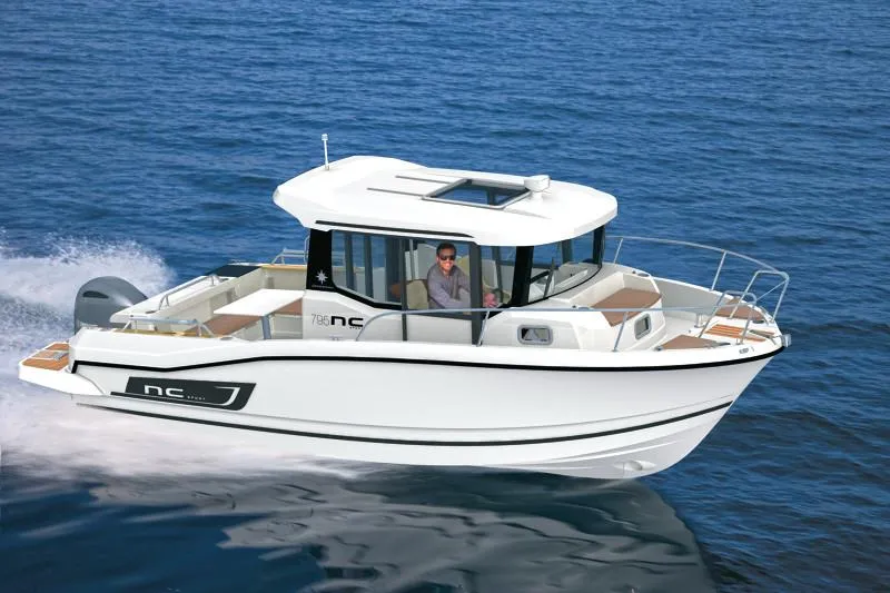 Slide: The Image of 2024 Jeanneau NC 795 Sport boat cruising on open water. - 3
