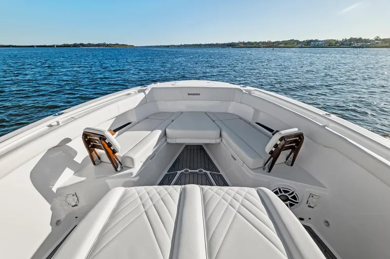 Slide: The Image of 2025 Everglades 375 Center Console boat interior on open water. - 13