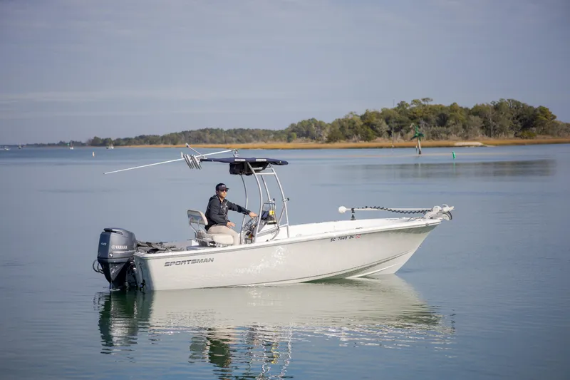Slide: The Image of 2017 Sportsman Island Reef 19 Center Console boat on calm water. - 4