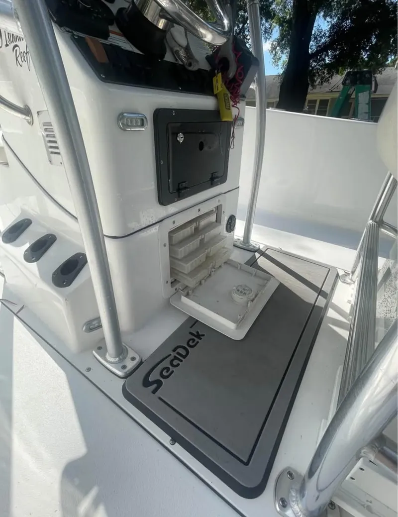 Slide: The Image of 2017 Sportsman Island Reef 19 Center Console interior with SeaDek flooring. - 9