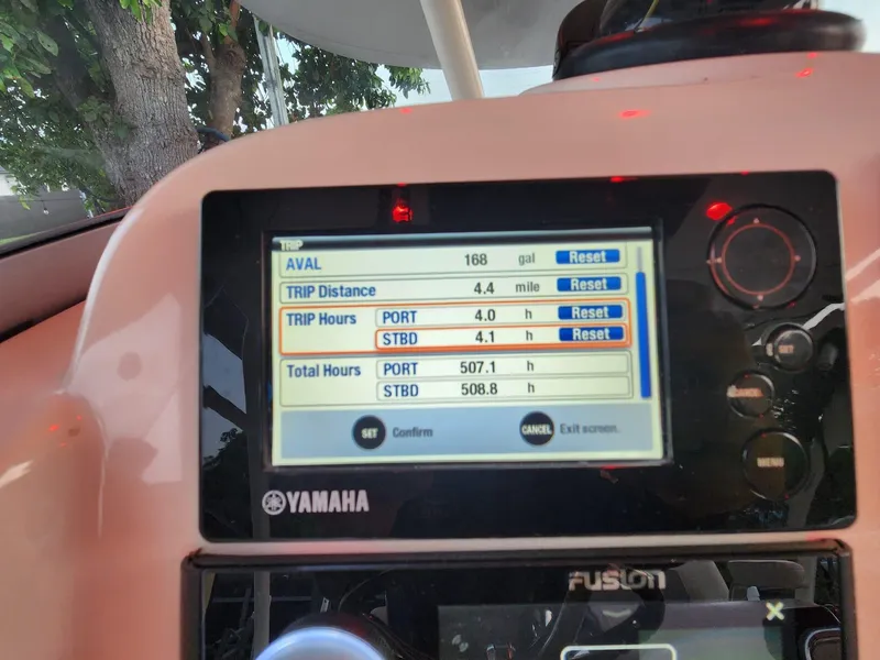 Slide: The Image of Yamaha boat dashboard display showing trip and total hours for Pursuit S 280 Sport, 2011. - 15