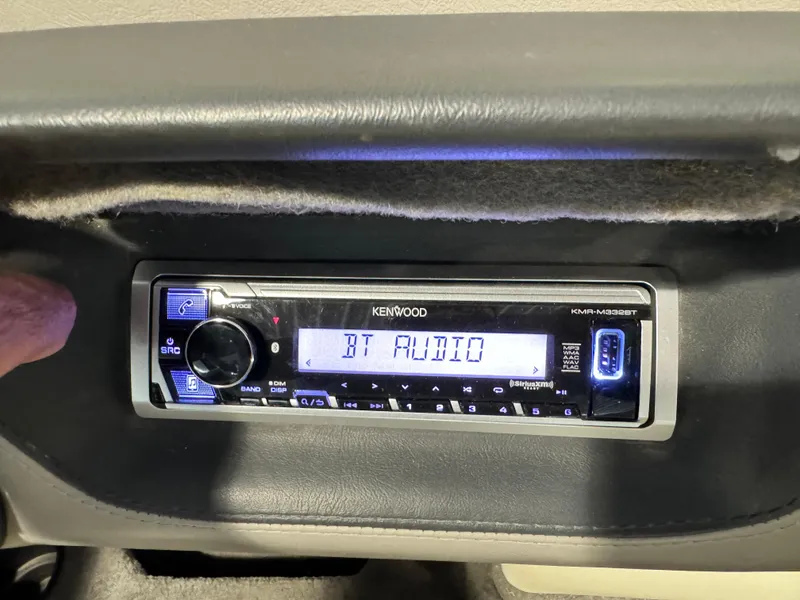 Slide: The Image of Kenwood stereo system in 2004 Malibu 20 Response LXI displaying "BT Audio". - 10