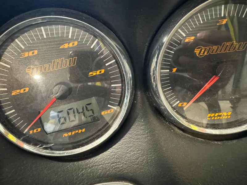 Slide: The Image of Dashboard of 2004 Malibu 20 Response LXI showing speedometer and tachometer. - 17