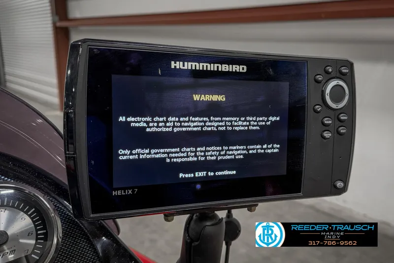 Slide: The Image of Humminbird Helix 7 GPS unit displaying warning message on Triton 18 TX, 2018 model. - 32