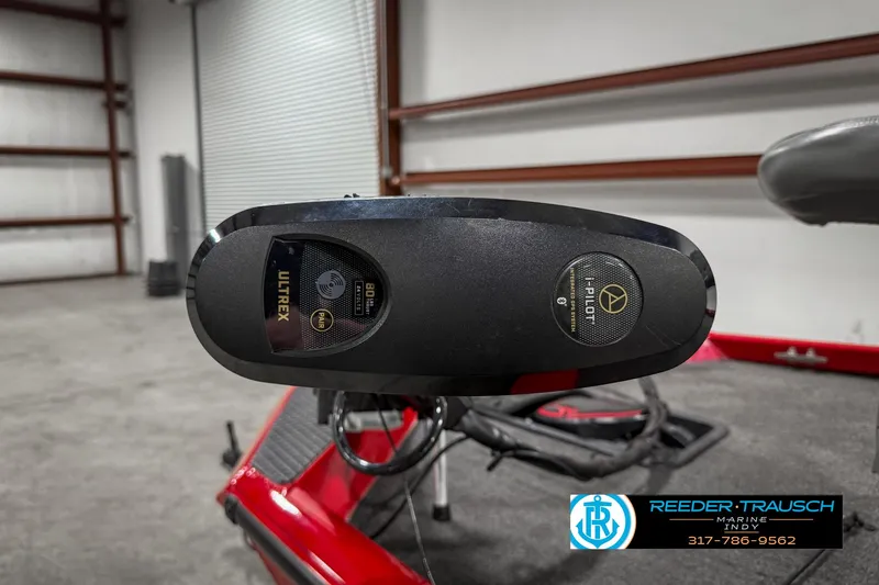 Slide: The Image of 2018 Triton 18 TX boat with Ultrex trolling motor in a warehouse setting. - 42
