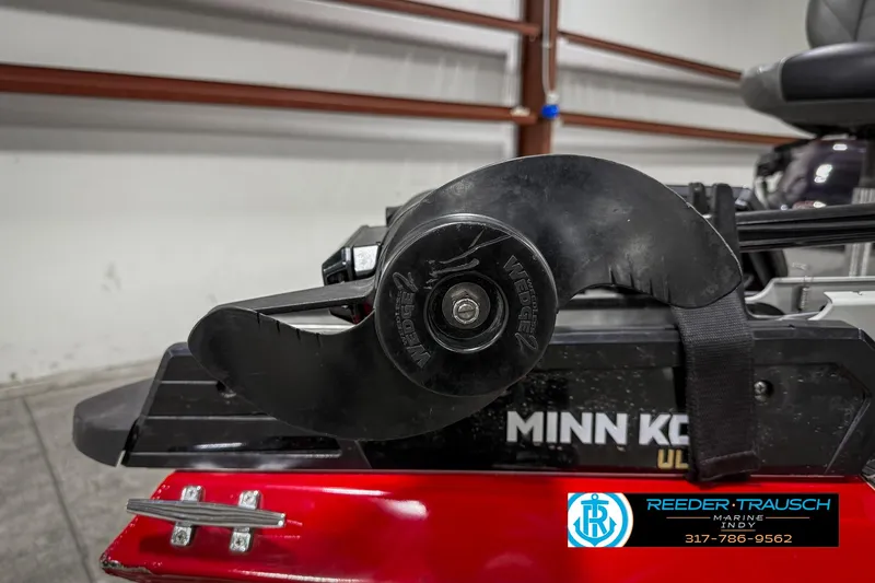 Slide: The Image of Close-up of a Minn Kota trolling motor on a 2018 Triton 18 TX boat. - 43