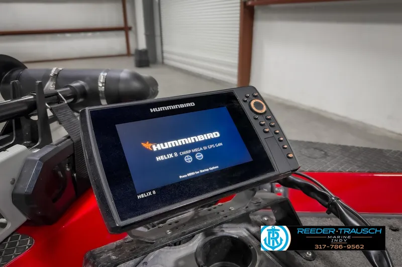 Slide: The Image of Humminbird Helix 9 fish finder on 2018 Triton 18 TX boat dashboard. - 45