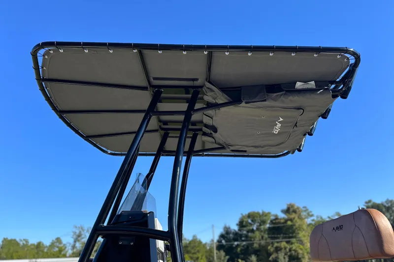 Slide: The Image of Avid 23 Fusion 2026 boat canopy against clear blue sky. - 30