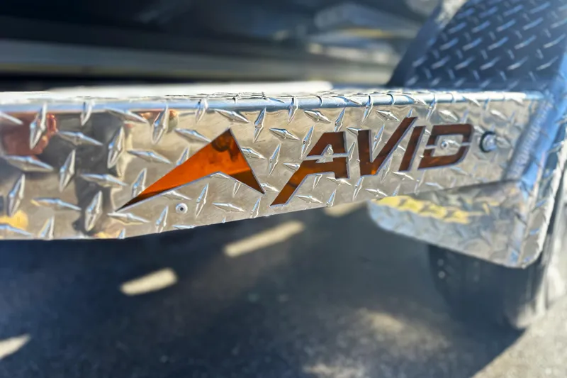 Slide: The Image of Close-up of Avid 23 Fusion 2026 logo on metallic surface. - 31