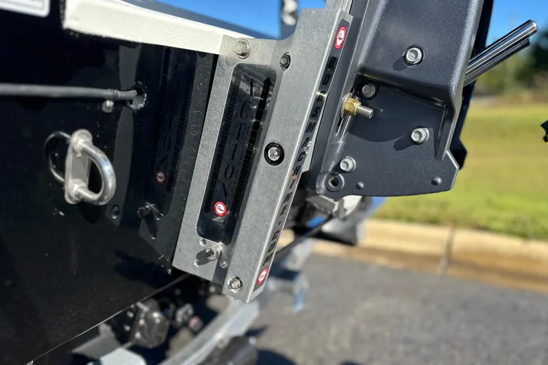 Slide: The Image of Close-up of 2026 Avid 23 Fusion boat's transom and mounting hardware. - 34