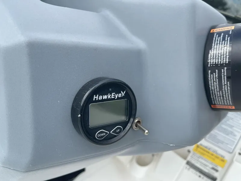 Slide: The Image of HawkEye depth finder on 2021 Tahoe T18 boat dashboard. - 14