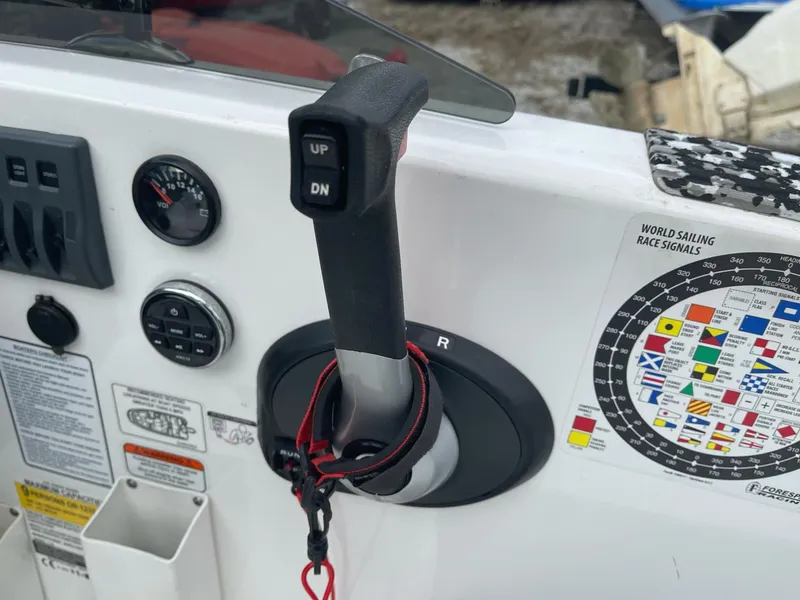 Slide: The Image of Tahoe T18 2021 boat throttle control with race signal chart and gauges. - 17