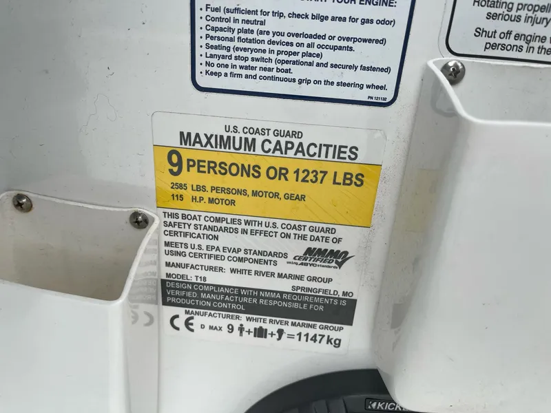 Slide: The Image of Tahoe T18 2021 boat capacity label: 9 persons or 1237 lbs, 115 HP motor. - 18