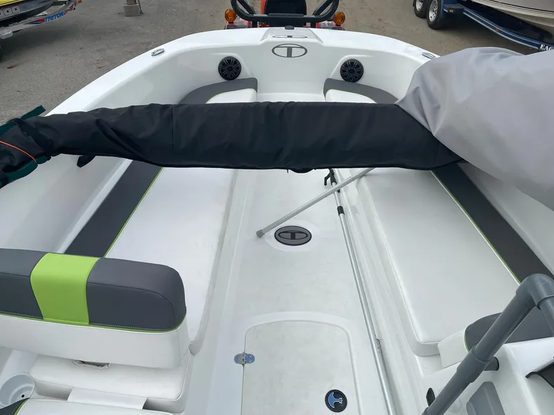 Slide: The Image of 2021 Tahoe T18 boat interior with seating and storage compartments. - 20