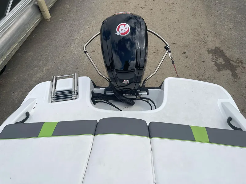 Slide: The Image of 2021 Tahoe T18 boat with Mercury outboard motor and swim platform. - 9