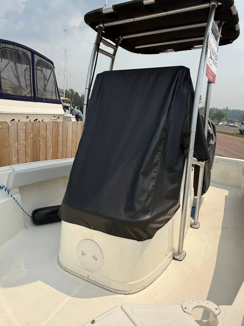 Slide: The Image of Mako 184 Center Console 2020 with navigation systems on a river. - 12