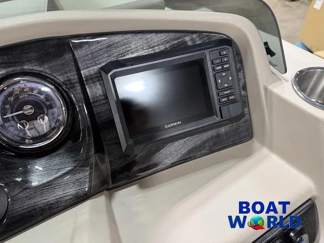 Slide: The Image of Dashboard of 2025 Tahoe LTZ 2385 Swingback with Garmin display and speedometer. - 15