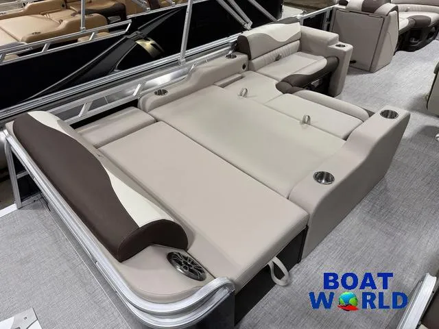 Slide: The Image of 2025 Tahoe LTZ 2385 Swingback boat interior with luxurious seating and cup holders. - 21