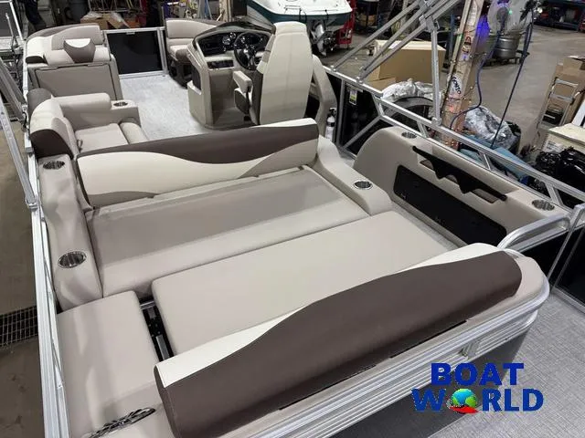 Slide: The Image of 2025 Tahoe LTZ 2385 Swingback boat interior with Honda 4-Stroke EFI engine, showcased at Boat World. - 25