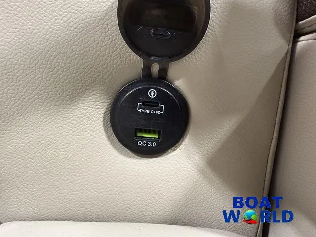 Slide: The Image of USB Type-C and QC 3.0 charging port on 2025 Tahoe LTZ 2385 Swingback boat. - 27