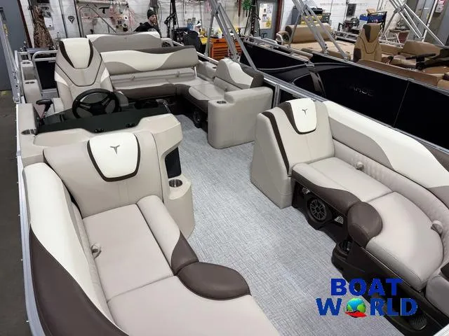 Slide: The Image of 2025 Tahoe LTZ 2385 Swingback pontoon boat interior with luxurious seating and modern design. - 35