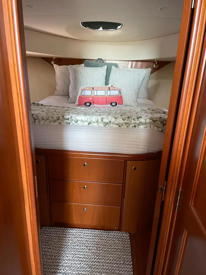 Slide: The Image of Cozy bedroom in 2007 Silverton 38 Convertible yacht with stylish decor. - 17