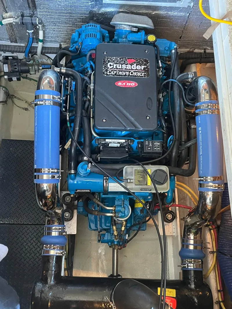 Slide: The Image of Engine of a 2007 Silverton 38 Convertible boat, featuring Crusader Captain's Choice. - 6