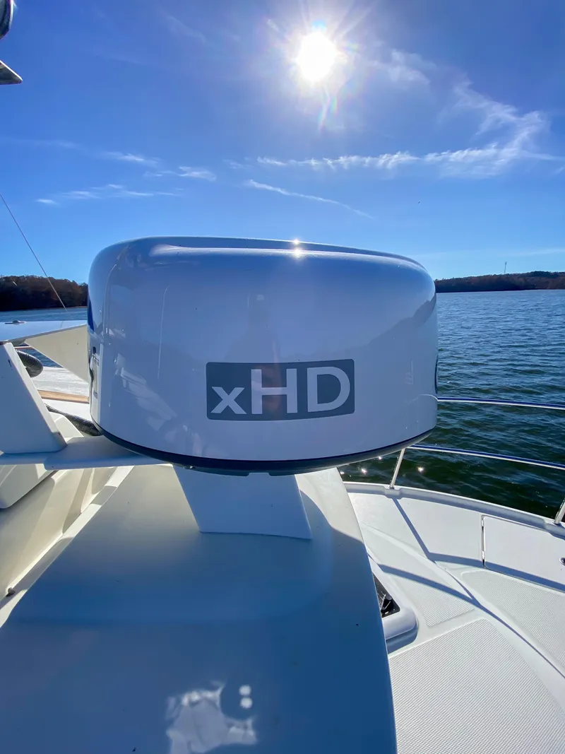 Slide: The Image of Radar equipment on 2017 Ranger Tugs R-29 CB boat under clear blue sky. - 12