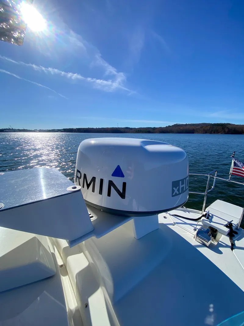 Slide: The Image of 2017 Ranger Tugs R-29 CB with Garmin radar on a sunny day at sea. - 13