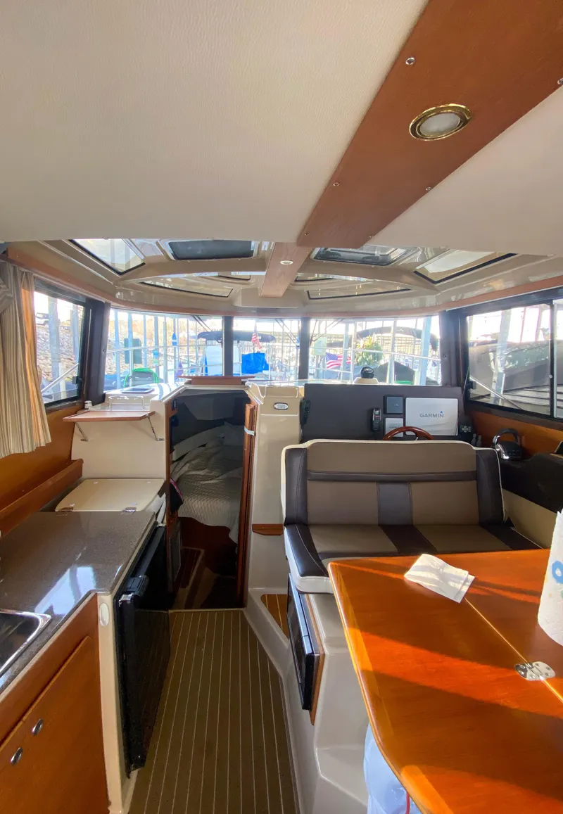 Slide: The Image of Interior of 2017 Ranger Tugs R-29 CB boat with modern amenities. - 16