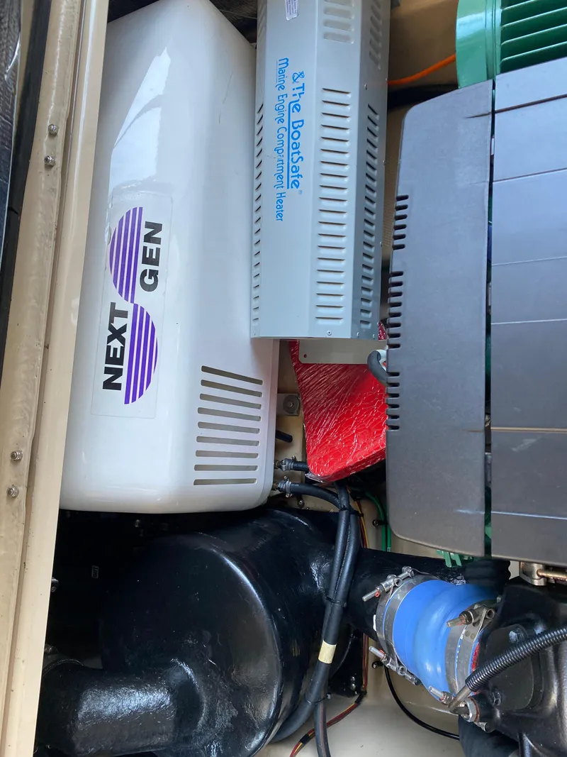 Slide: The Image of Engine compartment of 2017 Ranger Tugs R-29 CB with Next Gen generator. - 23