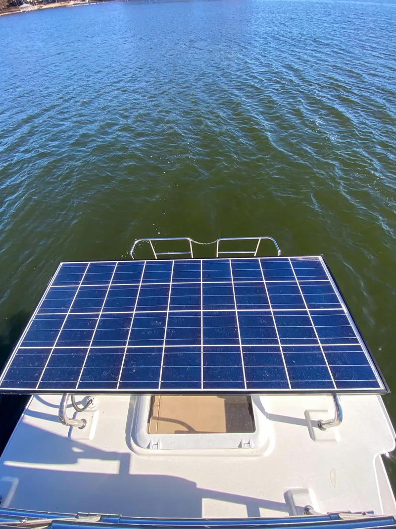 Slide: The Image of 2017 Ranger Tugs R-29 CB with solar panel on water. - 7