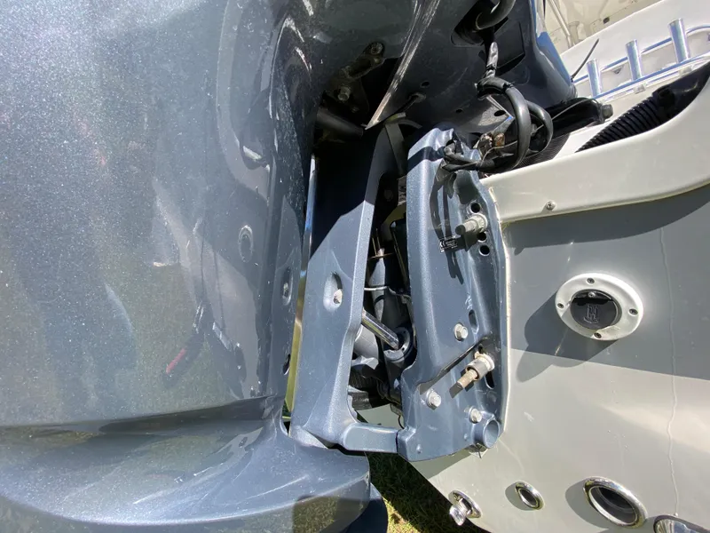 Slide: The Image of 2018 Tidewater 2400 Bay Max boat engine close-up, showcasing mechanical details and components. - 17