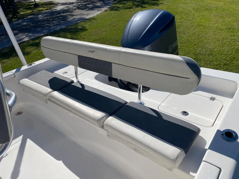 Slide: The Image of 2018 Tidewater 2400 Bay Max boat seating and engine detail. - 32
