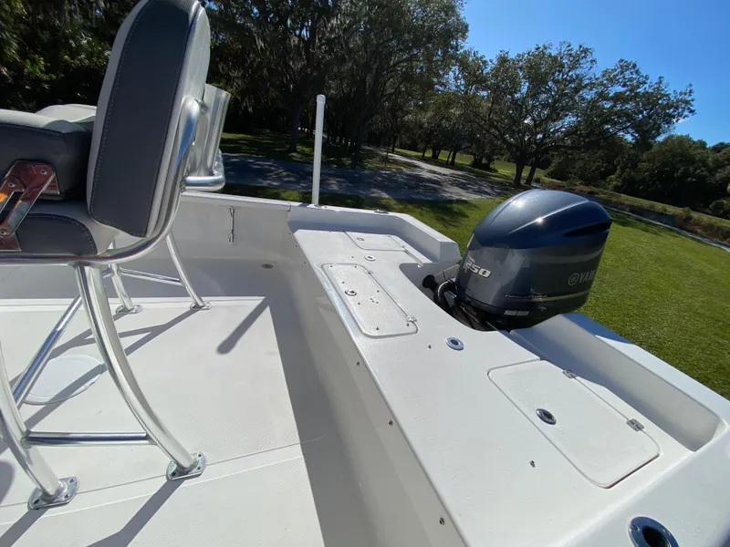 Slide: The Image of 2018 Tidewater 2400 Bay Max boat with Yamaha engine, outdoor setting. - 37