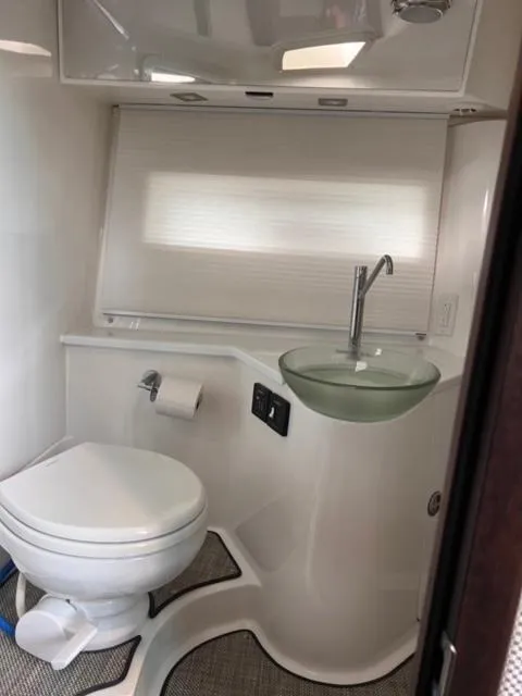 Slide: The Image of Modern bathroom in 2017 Cobalt A40 boat with sleek sink and toilet. - 10