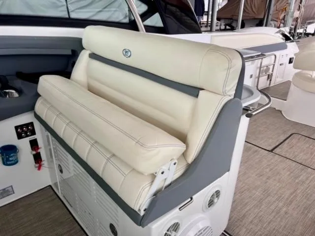 Slide: The Image of 2017 Cobalt A40 boat interior with beige seating and modern design. - 4