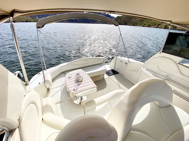 Slide: The Image of Sea Ray 380 Sundancer 2000 model, luxurious boat interior with lake view. - 10