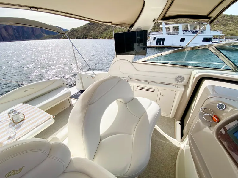 Slide: The Image of Interior of 2000 Sea Ray 380 Sundancer yacht with scenic water view. - 11