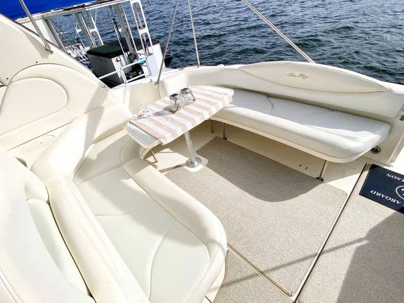 Slide: The Image of Luxurious seating area on 2000 Sea Ray 380 Sundancer yacht with ocean view. - 17