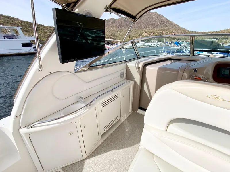 Slide: The Image of Interior of 2000 Sea Ray 380 Sundancer yacht with TV and seating. - 19