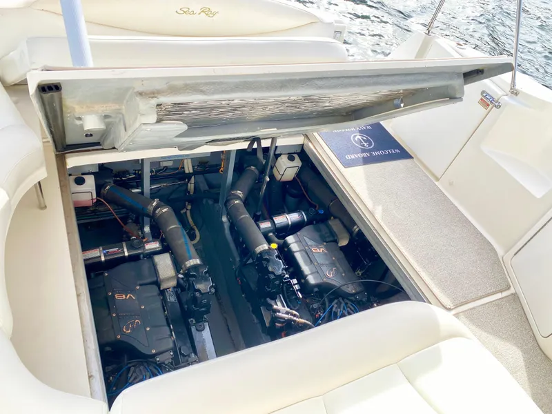 Slide: The Image of Engine compartment of 2000 Sea Ray 380 Sundancer boat, showcasing dual engines. - 21
