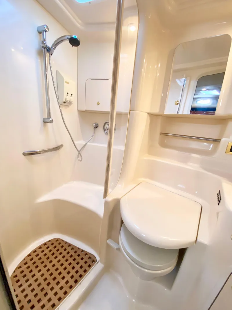 Slide: The Image of Luxurious bathroom in 2000 Sea Ray 380 Sundancer yacht with shower and toilet. - 35