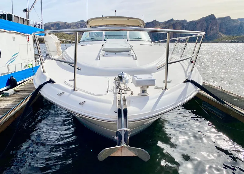 Slide: The Image of 2000 Sea Ray 380 Sundancer yacht docked on a sunny day. - 4