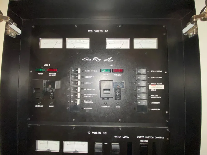 Slide: The Image of Electrical control panel of a 2000 Sea Ray 380 Sundancer boat. - 43