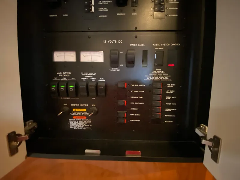 Slide: The Image of Electrical control panel on a 2000 Sea Ray 380 Sundancer boat. - 44