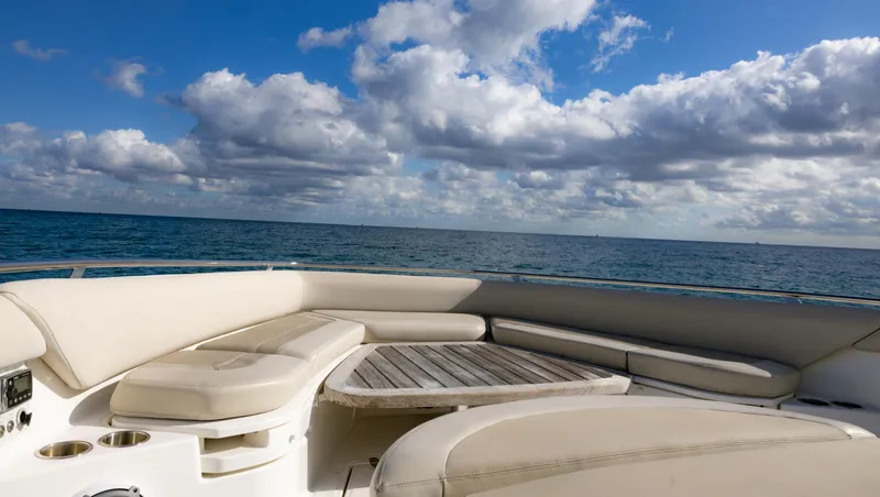 Slide: The Image of Boston Whaler 420 Outrage 2017 boat deck with ocean view and cloudy sky. - 13