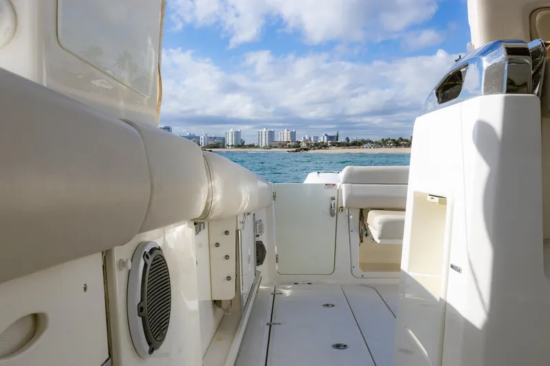 Slide: The Image of 2017 Boston Whaler 420 Outrage interior with ocean view and city skyline. - 8